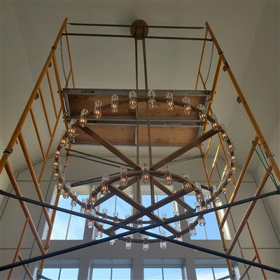 RH chandelier installed in Bridgehampton, NY on a 25' height ceiling.
