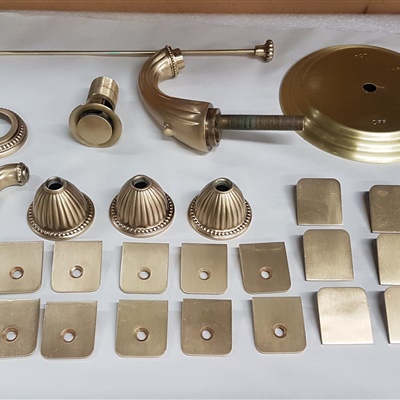 All these bathroom pieces were refinished in satin brass with a layer of clear coat to protect finish from water and steam.