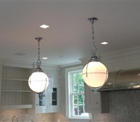 Pendants installed over kitchen bar in CT.