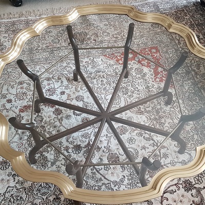 Brass table back in the house after refinish work is completed.