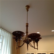 One of a kind chandelier installed over dinning room table on fifth Ave, New York, NY.