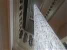 Cleaning of huge Cascade chandelier with Swarovski crystal by Vincent Van Duysen.